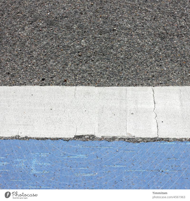 Road design with traces of use Street Pavement Road marking Asphalt Colour areas of colour Blue White Gray Traffic infrastructure Lane markings Deserted Design