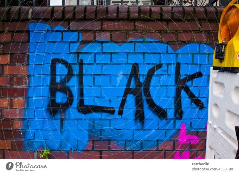 BLACK Remark black Black Lives Matter embassy Colour sprayed graffiti Grafitto illustration Art Wall (barrier) Message message Slogan policy Damage to property