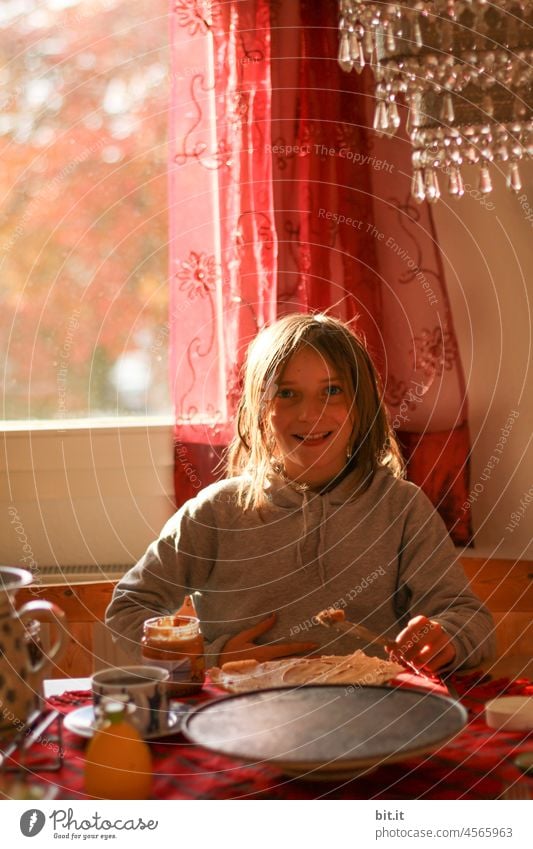 Yummy, yummy breakfast... Autumn Child Girl Infancy Human being naturally natural light Table Joy Breakfast Happy Happiness Joie de vivre (Vitality) Eating Meal