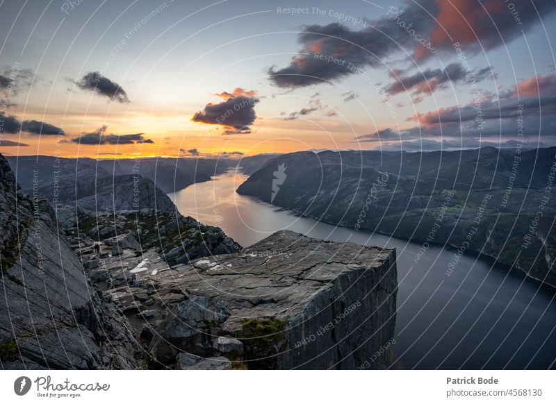 Sunrise over the mountains and the fjord Mountain Clouds Loneliness Rock Water Calm Lysefjord Landscape Hiking Scandinavia Deserted Bird's-eye view Colour photo