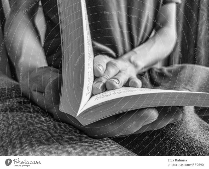 Man reading a book Book Reading To leaf (through a book) Education Library Literature Novel books School Academic studies Study Page Know Paper Reading matter