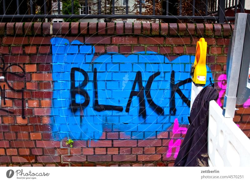 BLACK Remark black Black Lives Matter embassy Colour sprayed graffiti Grafitto illustration Art Wall (barrier) Message message Slogan policy Damage to property