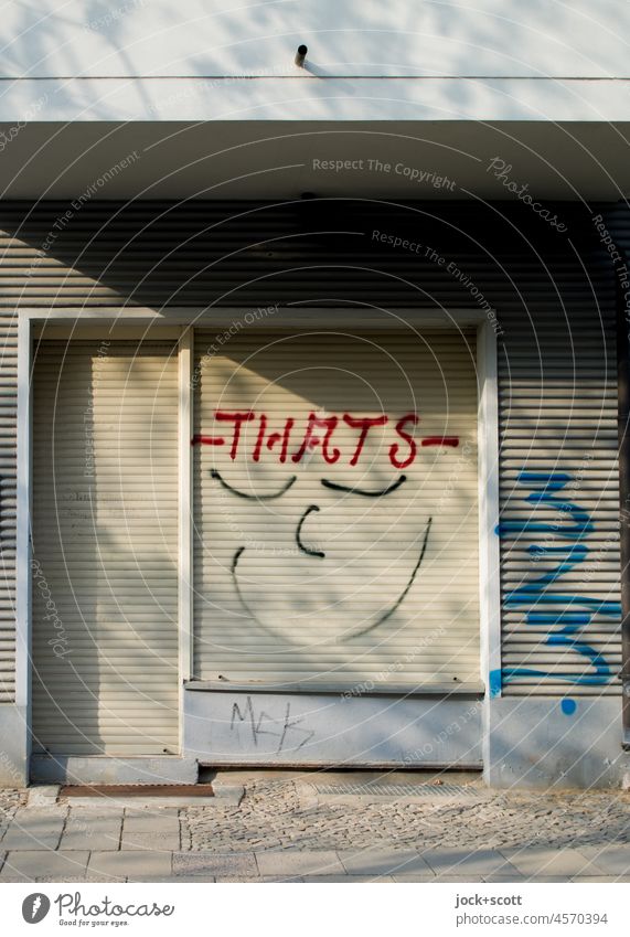 That's smile Roller shutter Storefront Spray Store premises Smiley Street art Closed Facade Wall (building) Doormat Moody Positive Smiling Prenzlauer Berg
