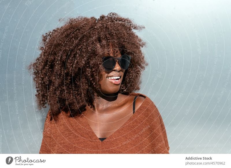 African American lady in sunglasses woman portrait hairstyle afro denim appearance confident top trendy individuality young fashion personality female black