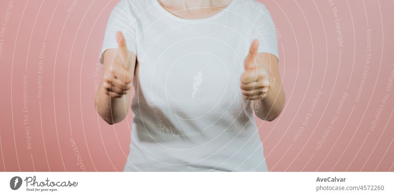 Young girl isolated on pink background. Copy space. Mock up. Summer woman clothes blank template white t shirt. t-shirt advertisement copy space people female