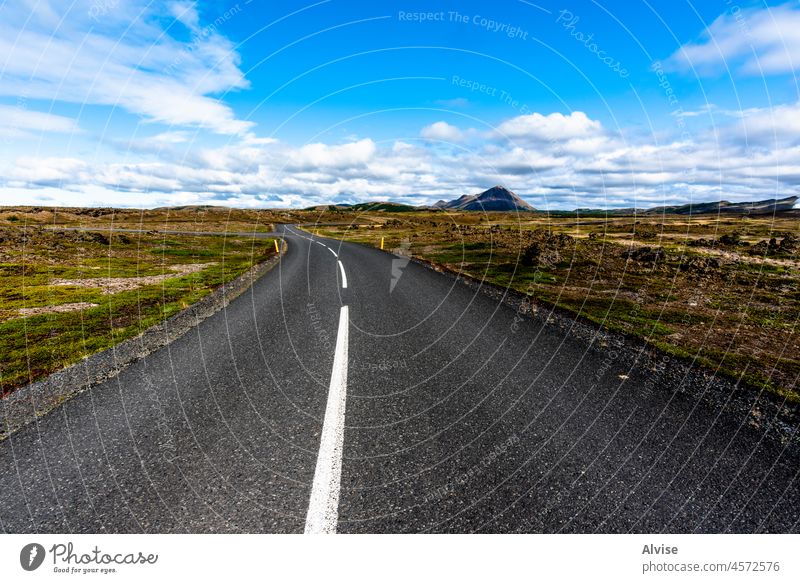 2021 08 13 Myvatn paved road nature landscape travel lava grass meadow iceland mountain europe scenery green rock outdoor water volcanic hill sky blue sunset