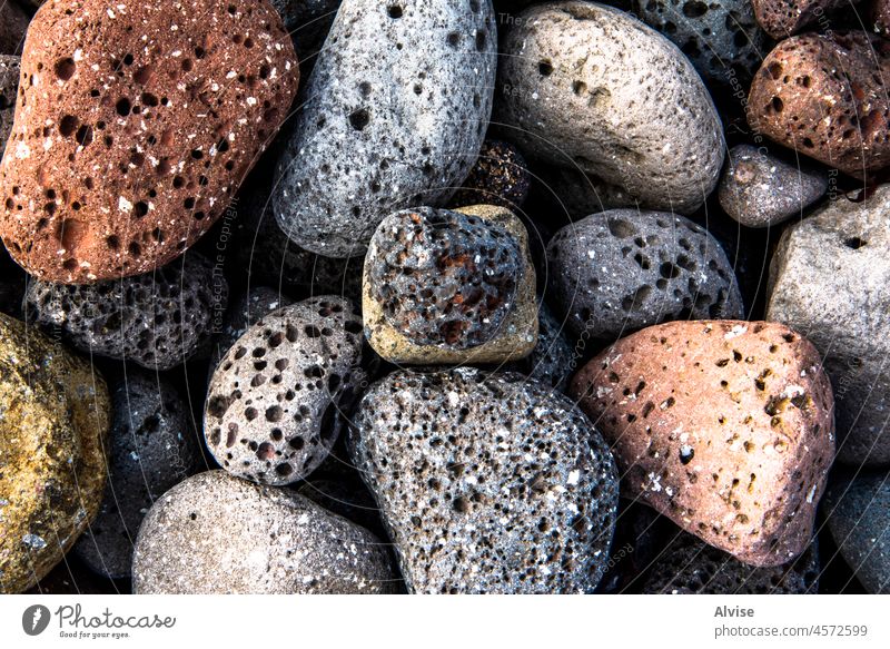 2021 08 13 Myvatn pebbles in the water's edge stone rock nature background lava geology black texture closeup natural material gray sand granite volcano pattern