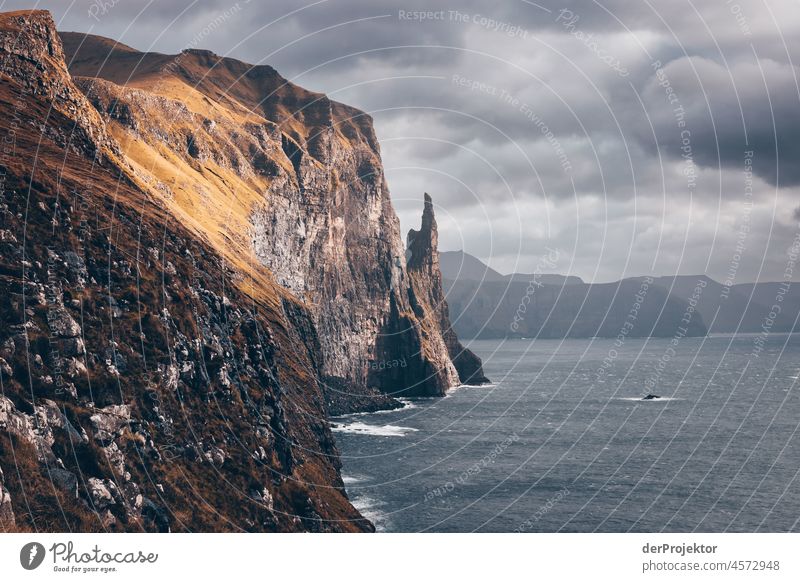 Faroe Islands: View of the "Witches Finger" in sunlight II Territory Slope curt Dismissive cold season Denmark Experiencing nature Adventure Majestic Curiosity