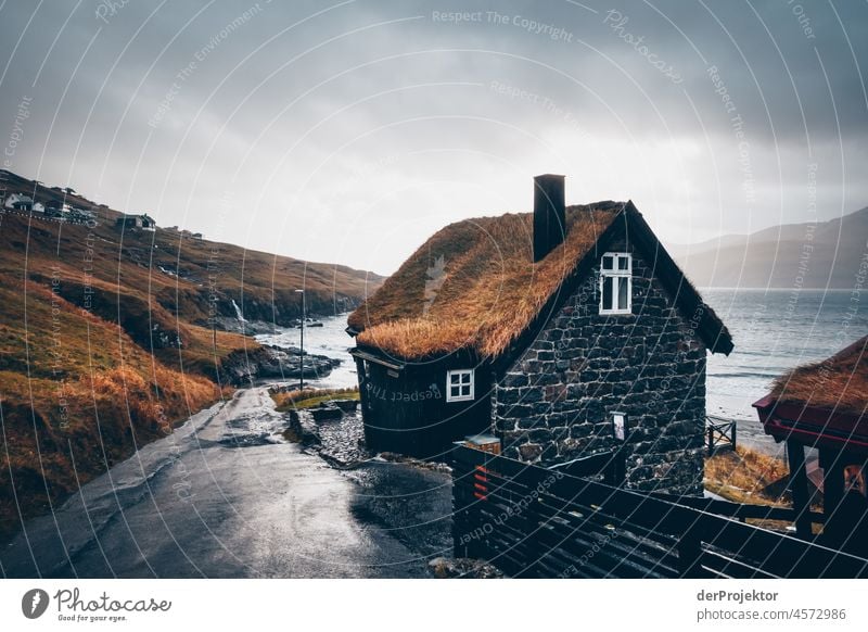 Faroe Islands: View of road, house and clouds Territory Slope curt Dismissive cold season Denmark Experiencing nature Adventure Majestic Curiosity