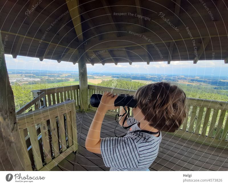 TV - boy standing on a wooden observation tower looking through binoculars Child Boy (child) Binoculars Looking Vantage point Lookout tower Tower far vision