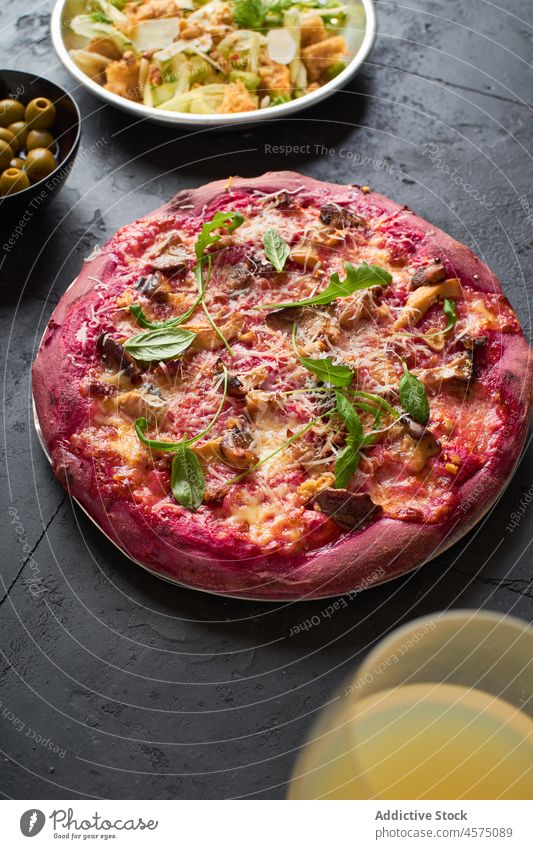 Purple colored rustic pizza vegetarian food healthy vegetable beet beetroot dinner meal dough delicious homemade fresh italian green cookery snack salad