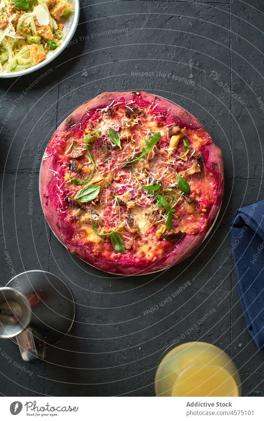 Purple colored rustic pizza vegetarian food healthy vegetable beet beetroot dinner meal dough delicious homemade fresh italian green cookery snack salad