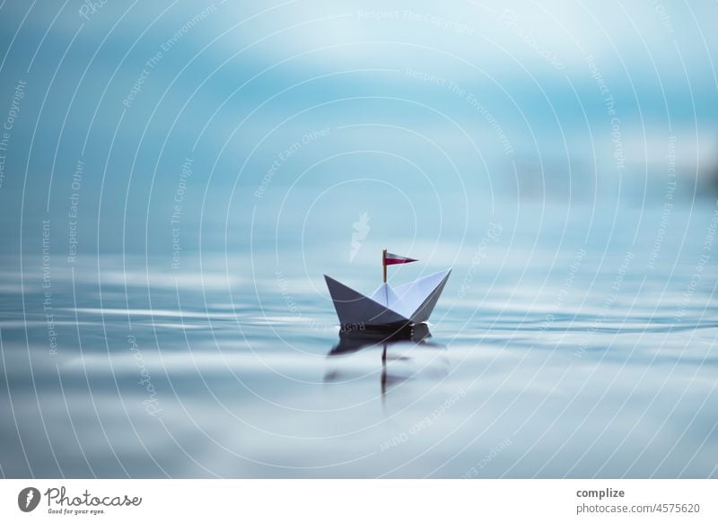 paper shuttle voyager Freedom Sunlight Reflection Travel photography Paper boat Target Sailboat coast Boating trip Navigation Infancy Environment Nature Water