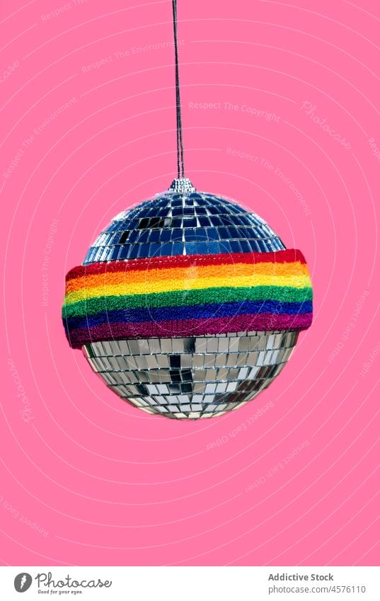 Disco ball with LGBT band scrunchy disco lgbt rainbow symbol concept tolerance equal solidarity colorful bright decoration light design shiny hang trendy
