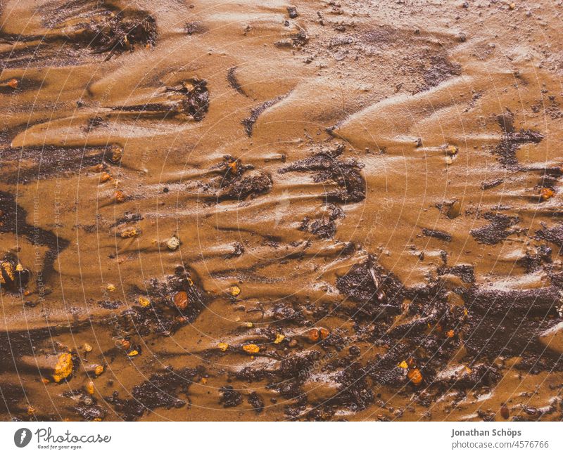 Mud on the floor in earthy brown Woodground Ground Earth Wet Brown off Deluge Nature Dirty Environment Exterior shot background Earthy Surface country naturally