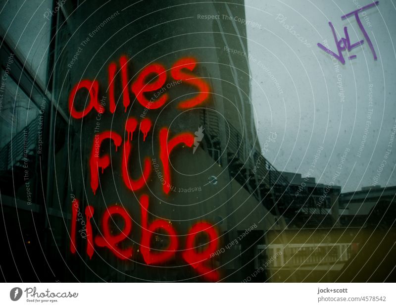 everything for love at the site Reflection Characters German Everything for love Berlin TV Tower Spray Handwritten Street art Alexanderplatz Tags grey sky Red