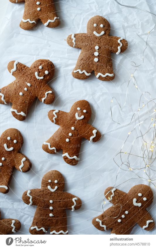 gingerbread men Gingerbread Gingerbread man Christmas & Advent Fairy lights Baking smile Smiley kind happy conformity conformal Equal little man Joy Baked goods