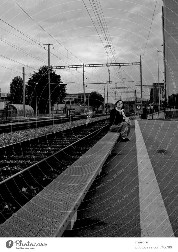 ghost station Think Sombre mood Woman Black & white photo Train station ponder menacingly tracks