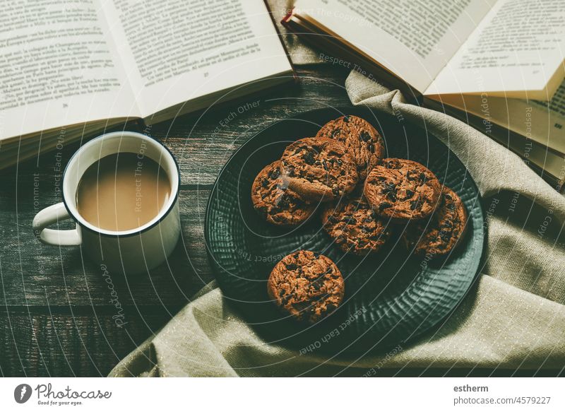 Top view of books with cup of coffee and chocolate cookies. Selective focus read textbook know learn study relax bookstore reading relaxing library hobby