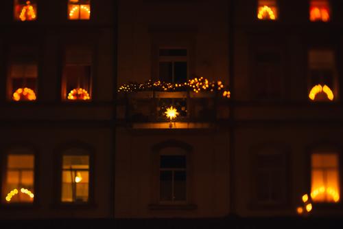 Christmas lights in the windows of an apartment building Christmas fairy lights Fairy lights clearer Christmas & Advent out Dark Evening Illuminate Lighting