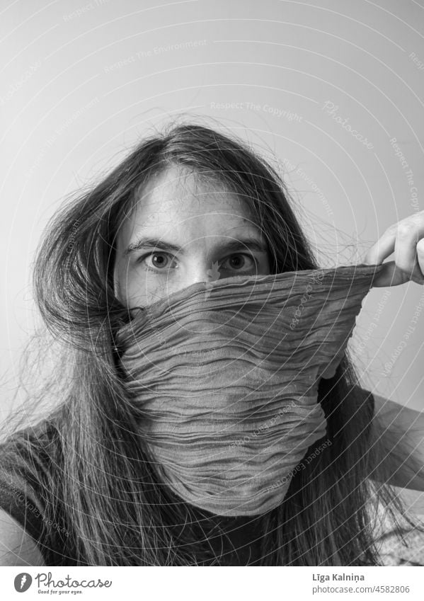 Obscured face by scarf in black and white obscured obscured face Woman Dark female Nature Human being Focal point Face Adults Scarf Eyes Looking into the camera