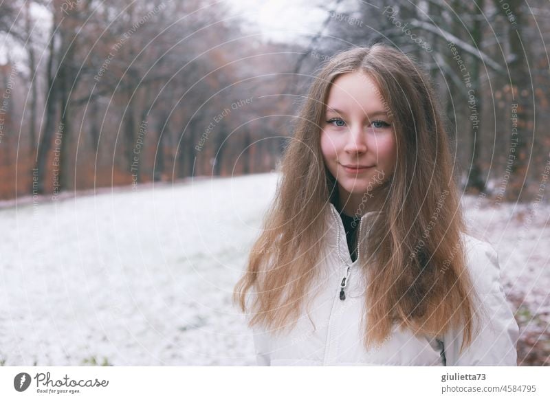 Winter portrait of long haired teen girl outside in park teenager Girl Exterior shot Winter's day Front view Youth (Young adults) Young woman youthful