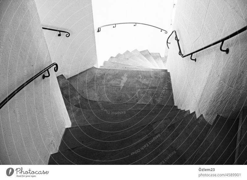 Spiral staircase with countless steps Stairs Winding staircase Black & white photo Architecture rail Deserted Banister Upward Downward Wall (building)