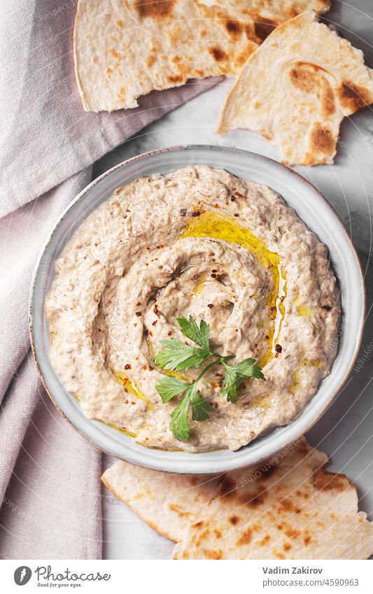 Baba ganoush, Ezme of oriental, Levantine cuisine with lavash and herbs made from baked eggplant with sesame paste appetizer arabic cuisine aubergine