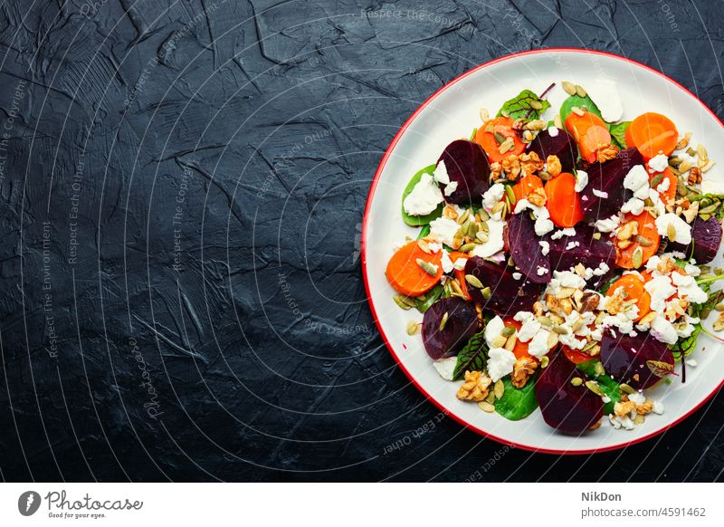 Vegetable salad with cottage cheese and nuts vegetable healthy food curd fresh diet walnut carrot plate delicious dish beet green lettuce beetroot eating rustic