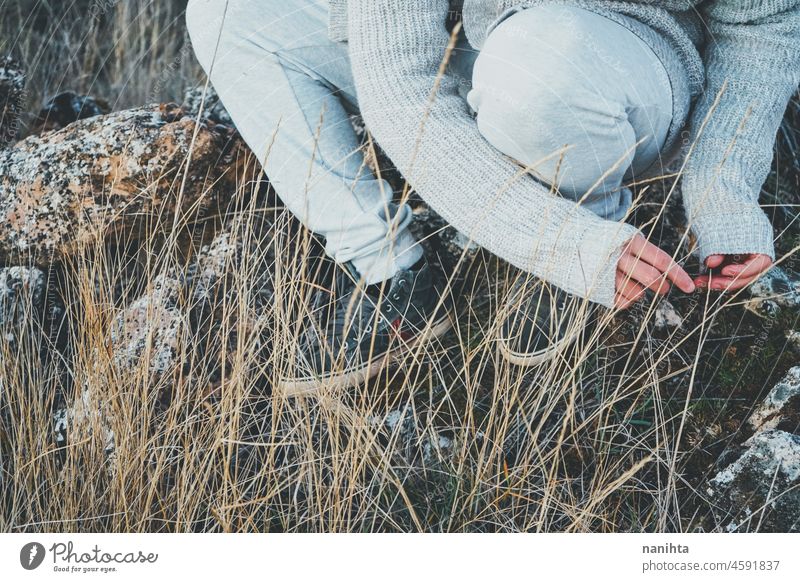 Delicate image of a young man touching nature delicate fragile new modern masculinity natural male real people lifestyle detail concept silence quiet patience