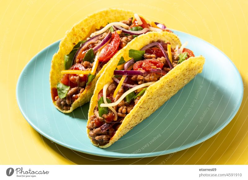 Traditional Mexican tacos with meat and vegetables beef cheese color dinner food fresh ingredient isolated lettuce mexican onion pepper spicy tomato tortilla