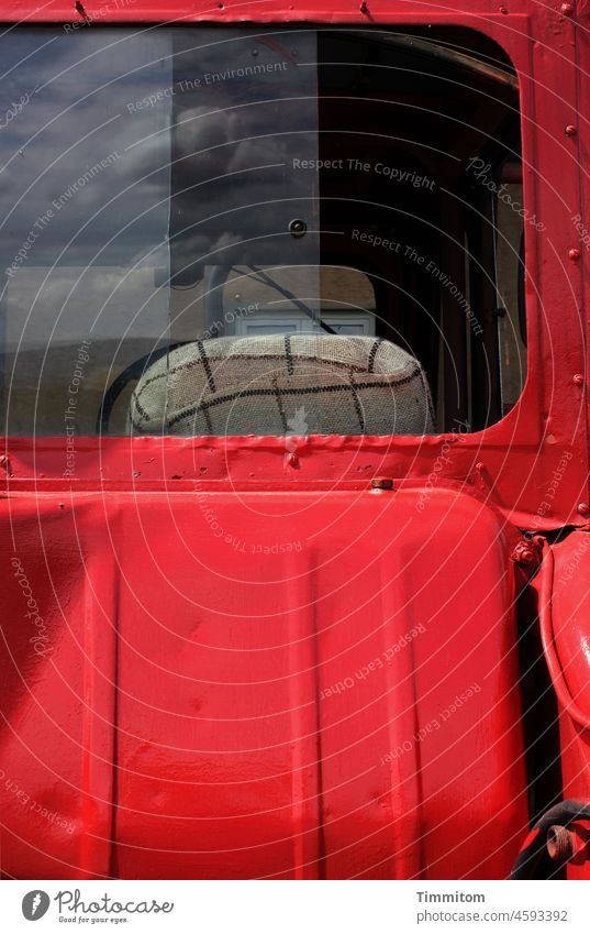 Partial view vehicle - red Vehicle Utility vehicle Metal Agriculture Red Pane Slice Glass reflection Sky Reflection Deserted Colour photo Light Shadow Seat
