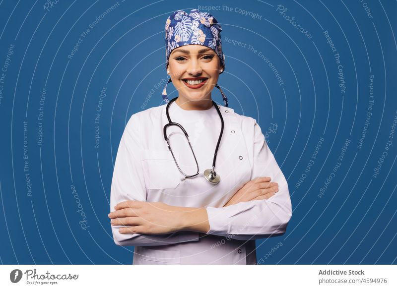 Smiling female doctor in white uniform with stethoscope woman professional robe medical physician smile specialist health care work portrait occupation job
