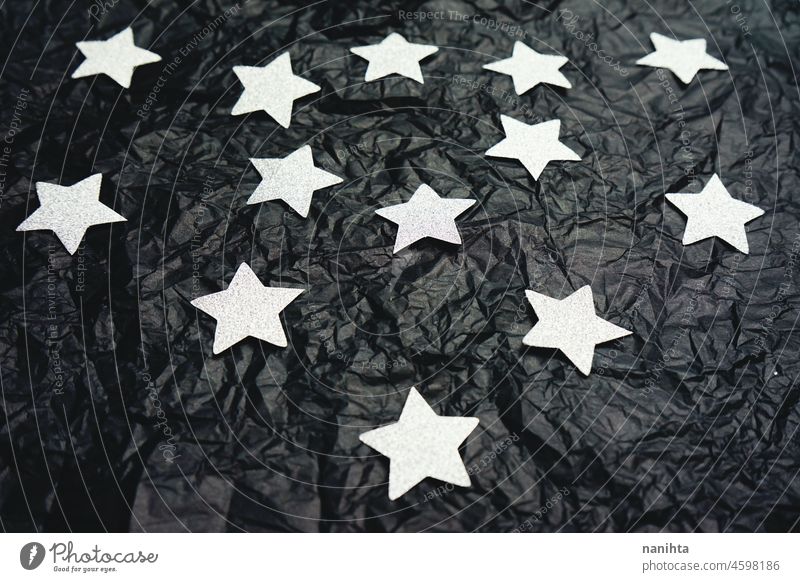Fake sky night doing with silver stars and crumpled black paper concept abstract background plastic glitter texture surface imagen idea dreams dark darkness