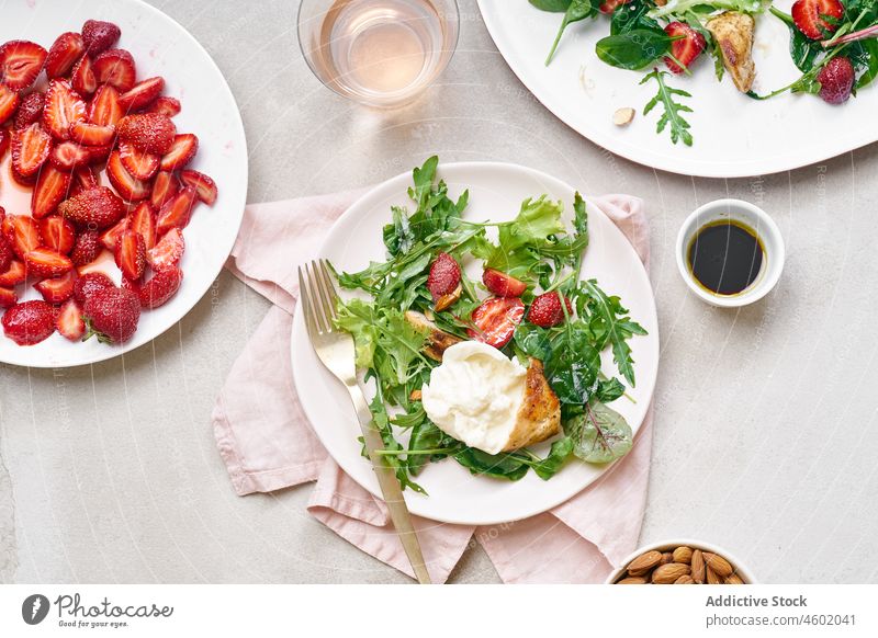 Salad with grilled chicken and strawberries salad healthy plate burrata flavor combination unusual gourmet cookery food meal organic delicious lunch lettuce