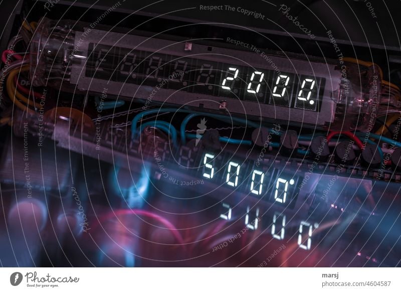 2000 or 5000? Confusion with digital digits. figures Digits and numbers 2,000 5,000 Technology disheveling Transposed numbers Reflection upside down Dark somber