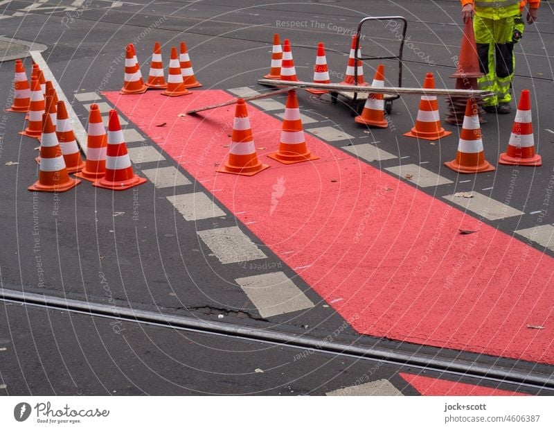 new bike lane or collect the hats all again Lane markings Cycle path Street Asphalt Traffic cone New Traffic infrastructure Pylon Dashed line