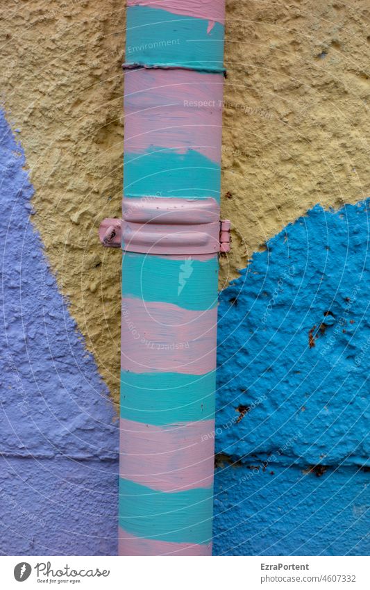 cheerful downpipe Colour variegated motley Wall (building) Downspout Rain gutter conduit Facade Blue purple Yellow Turquoise Pink lines Abstract Wall (barrier)