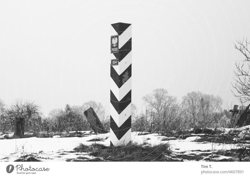 a Polish border marker on the Oder border limit marking Poland poliska Snow b/w Black & white photo Exterior shot Deserted Day B/W Border Loneliness Calm