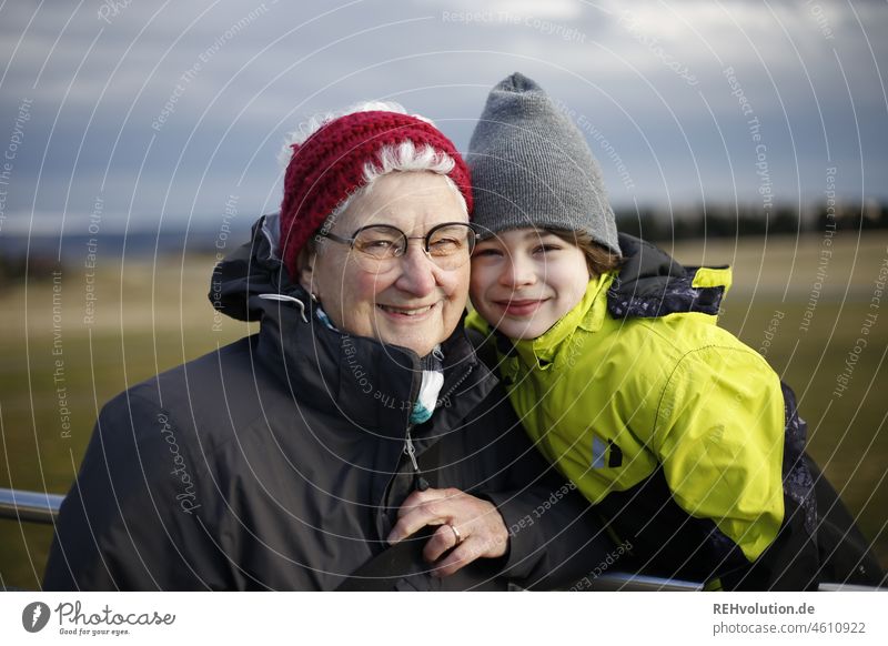 Boy with granny in nature Human being Child Boy (child) Woman Female senior Grandmother Infancy Environment Nature Smiling Laughter Old Together Happy Joy