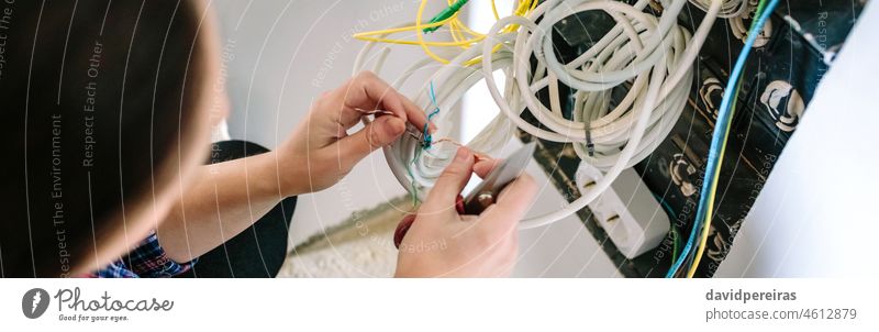 Unrecognizable female technician installing lan network top view unrecognizable installer telecommunication banner web header panorama panoramic cable