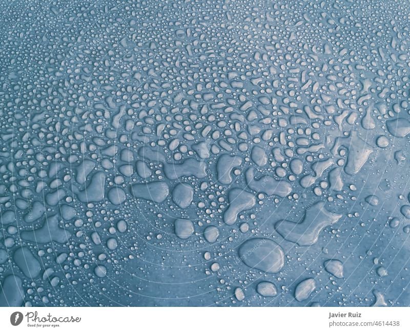 water drops of different sizes on a blue surface, drops texture, rain on blue tile, rain texture, refreshing background bluish freshwater horizontal liquid