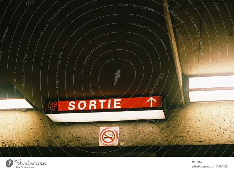 exit sign Underground Montreal ligt concrete dark Town