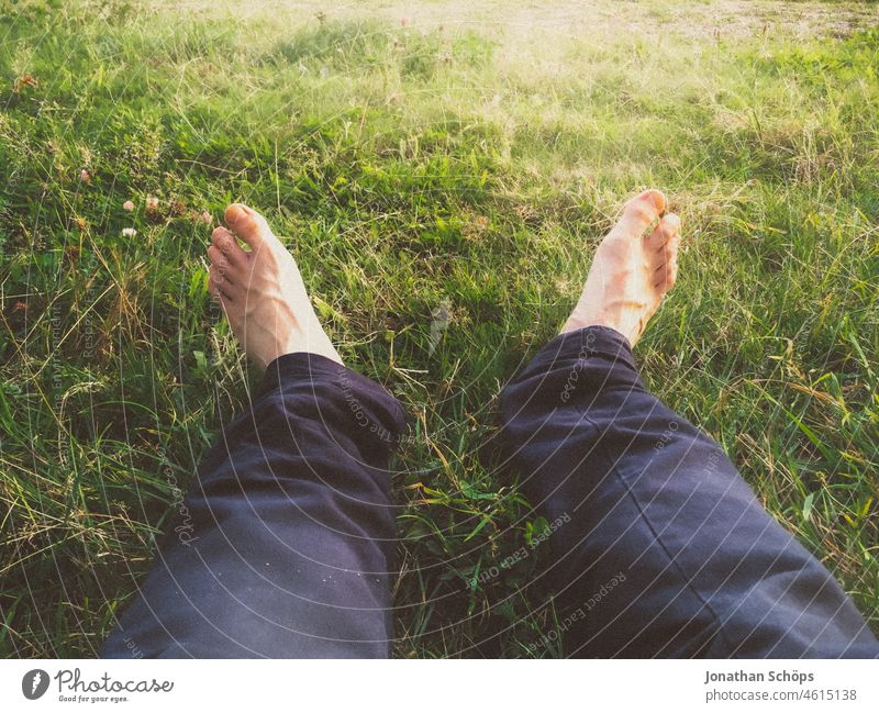 sitting barefoot on a meadow Forest out outdoor hike forest hike Hiking Hand stop First person view Nature Exterior shot Colour photo Vacation & Travel