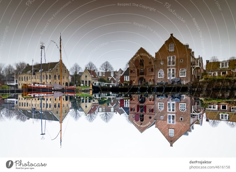 View of the historic houses in a reflection of Dokkum in winter Historic Buildings Gracht Tourist Attraction House (Residential Structure) Downtown Port City