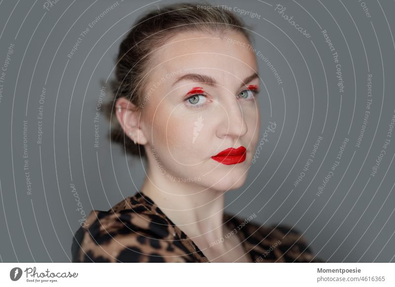 woman with red make up Woman Red Wearing makeup Piercing Ear piercing helix red lips Lips differently Apply make-up Make-up Eye make-up Eye shadow Brunette