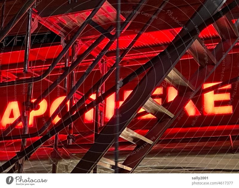 Red Light District Pharmacy Pharmaceutics Leuchschrift Healthy Health care Neon sign Red light Red-light district lettering Characters Ladder Scaffolding