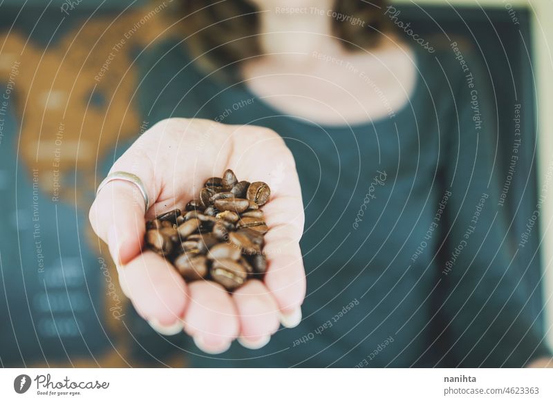 Woman hand holding natural coffee grains food organic integral map world import export exportation importation granel woman bio eco organic food tasty flavour