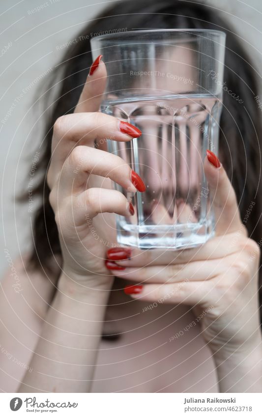 Woman holding empty glass without water hydration Healthy Eating Exterior shot Pure Thirsty Nutrition Detail Summer Carbonic acid Day Food Colour photo Tumbler