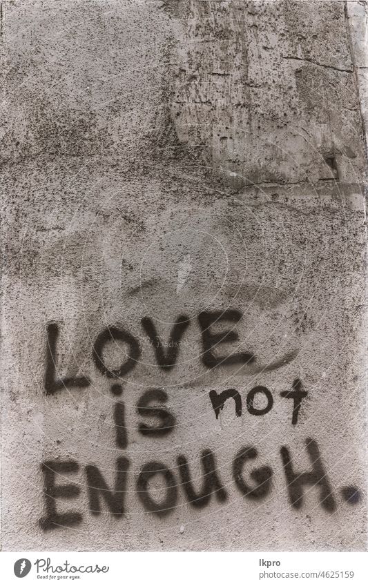 in the old wall the words of love denial day heart background no abstract texture vintage paint dirty rough negative wrong ban enough white grunge design